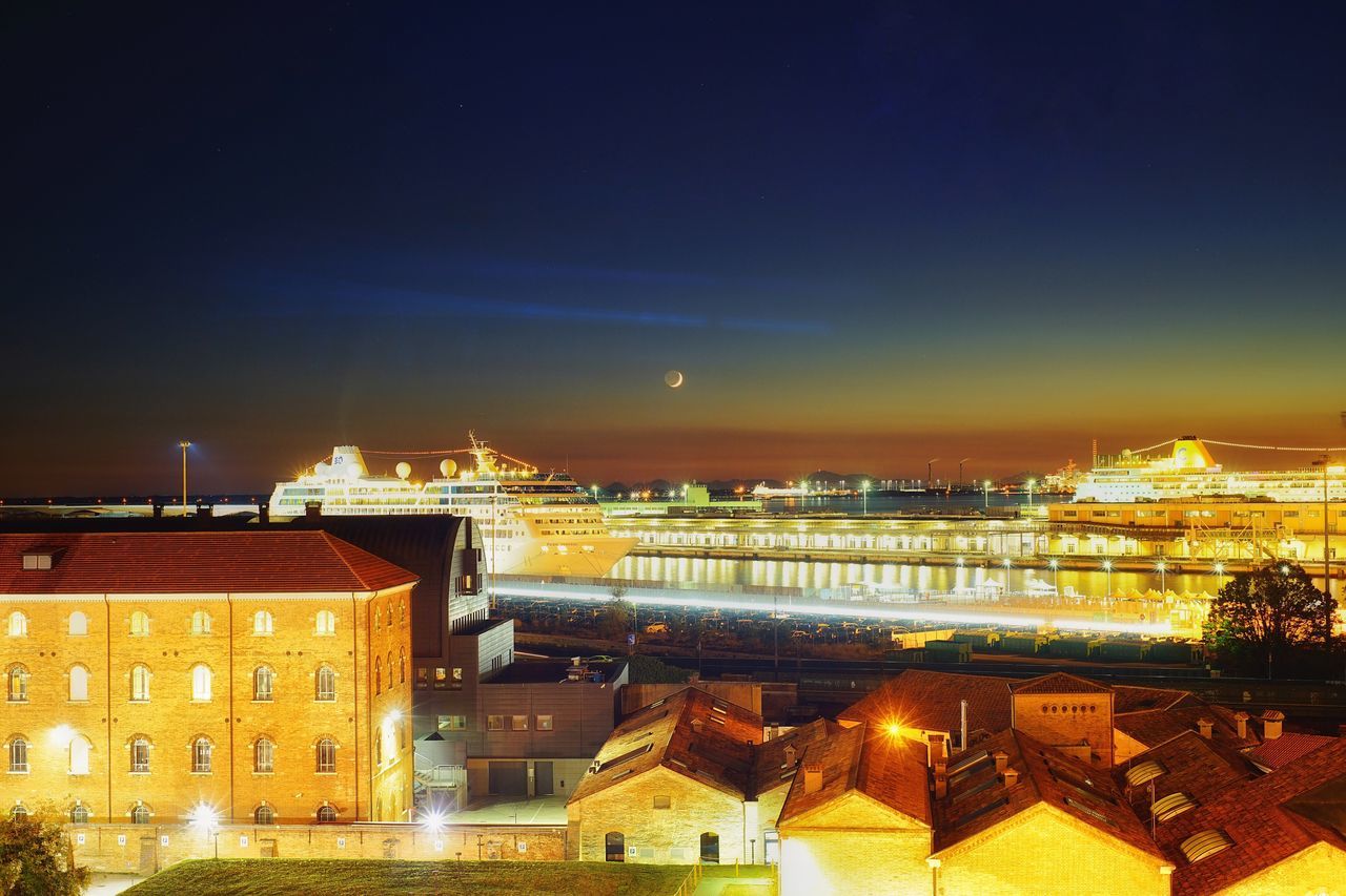 architecture, building exterior, built structure, illuminated, night, sky, cityscape, no people, city, outdoors, water, nature