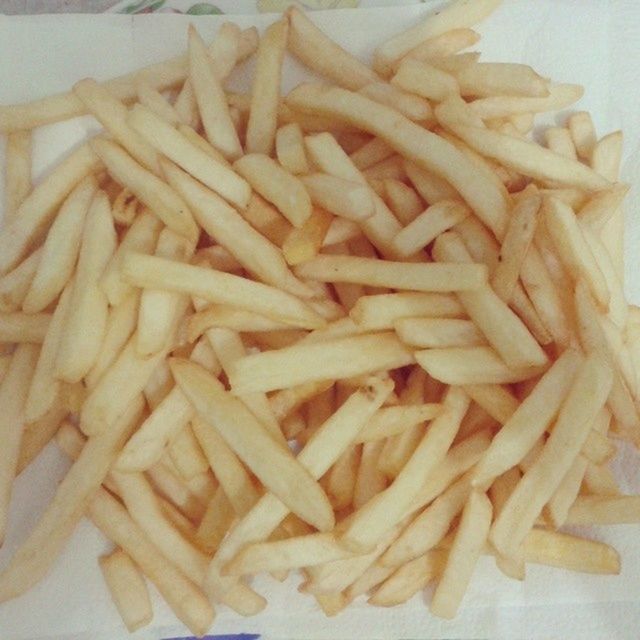 food, food and drink, indoors, freshness, ready-to-eat, french fries, still life, close-up, unhealthy eating, fast food, pasta, fried, indulgence, deep fried, prepared potato, high angle view, snack, plate, table, meal