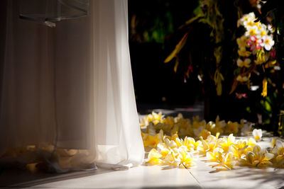 Flowers on table at night