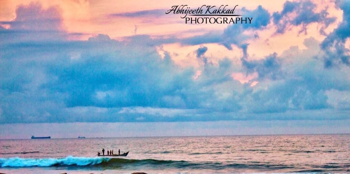 sea, sky, horizon over water, water, cloud - sky, beach, scenics, tranquility, tranquil scene, beauty in nature, cloudy, sunset, nature, shore, cloud, idyllic, sand, transportation, incidental people, nautical vessel