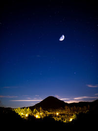 Scenic view of moon in sky at night