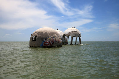 View of ship in sea against sky