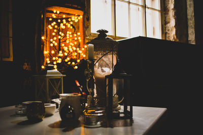 Light candles on table