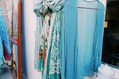 Close-up of clothes hanging in store for sale