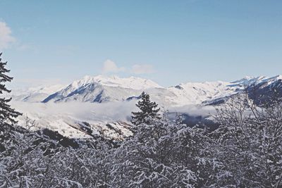 Scenic view of snow covered mountains