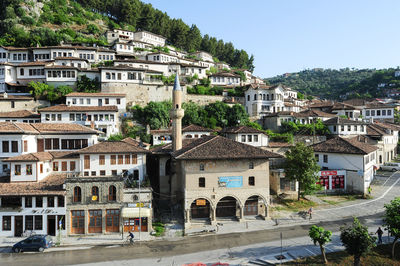 Buildings in city against sky