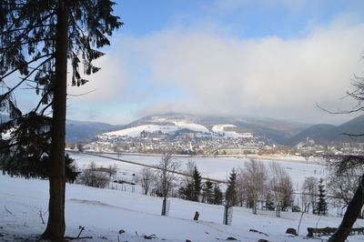 Scenic view of snowcapped mountains against sky