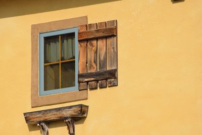 Yellow window on building