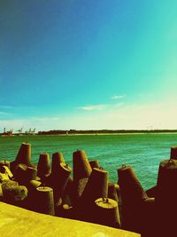 Scenic view of sea against clear blue sky