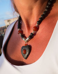 Close-up of woman with heart shape