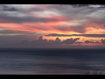 Scenic view of dramatic sky during sunset