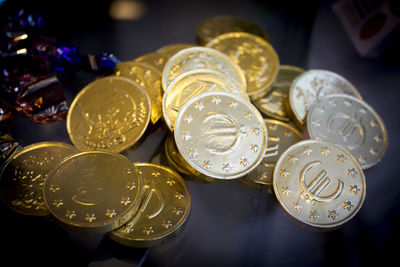 Close-up of coins on table