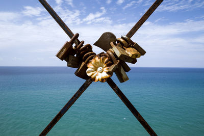 Close-up of blue sea against sky