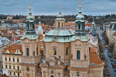 Buildings in city against sky