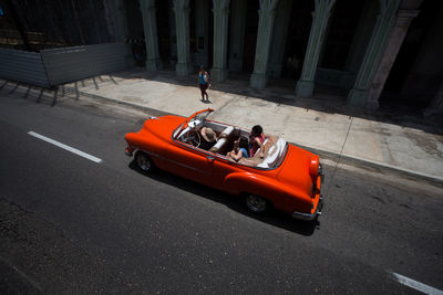 High angle view of people in car on street