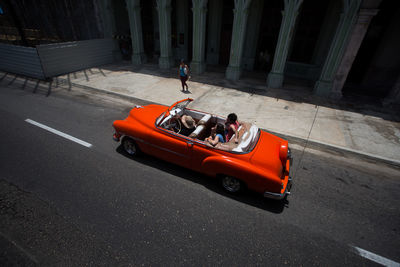 High angle view of people in car on street