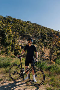 Man riding bicycle on mountain