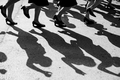 Low section of people standing on floor