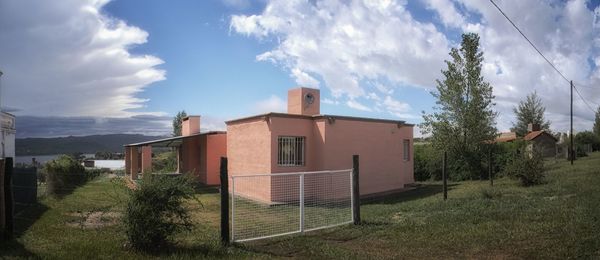 Panoramic shot of buildings against sky