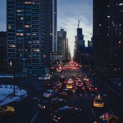 View of city street at dusk