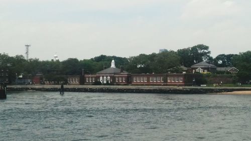 View of river with buildings in background