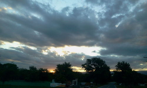 Scenic view of landscape against cloudy sky