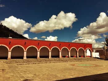 View of building against cloudy sky