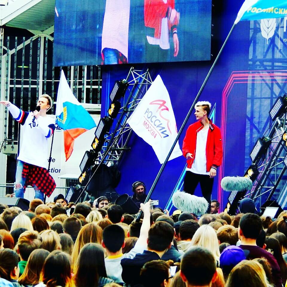 crowd, large group of people, group of people, real people, flag, city, women, street, architecture, men, protest, day, patriotism, adult, outdoors, lifestyles, built structure, event, protestor, spectator, stage