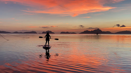 Sunset paddle boarding