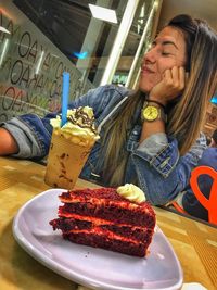 Close-up of woman eating ice cream