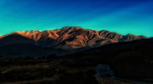 Scenic view of mountains against clear sky