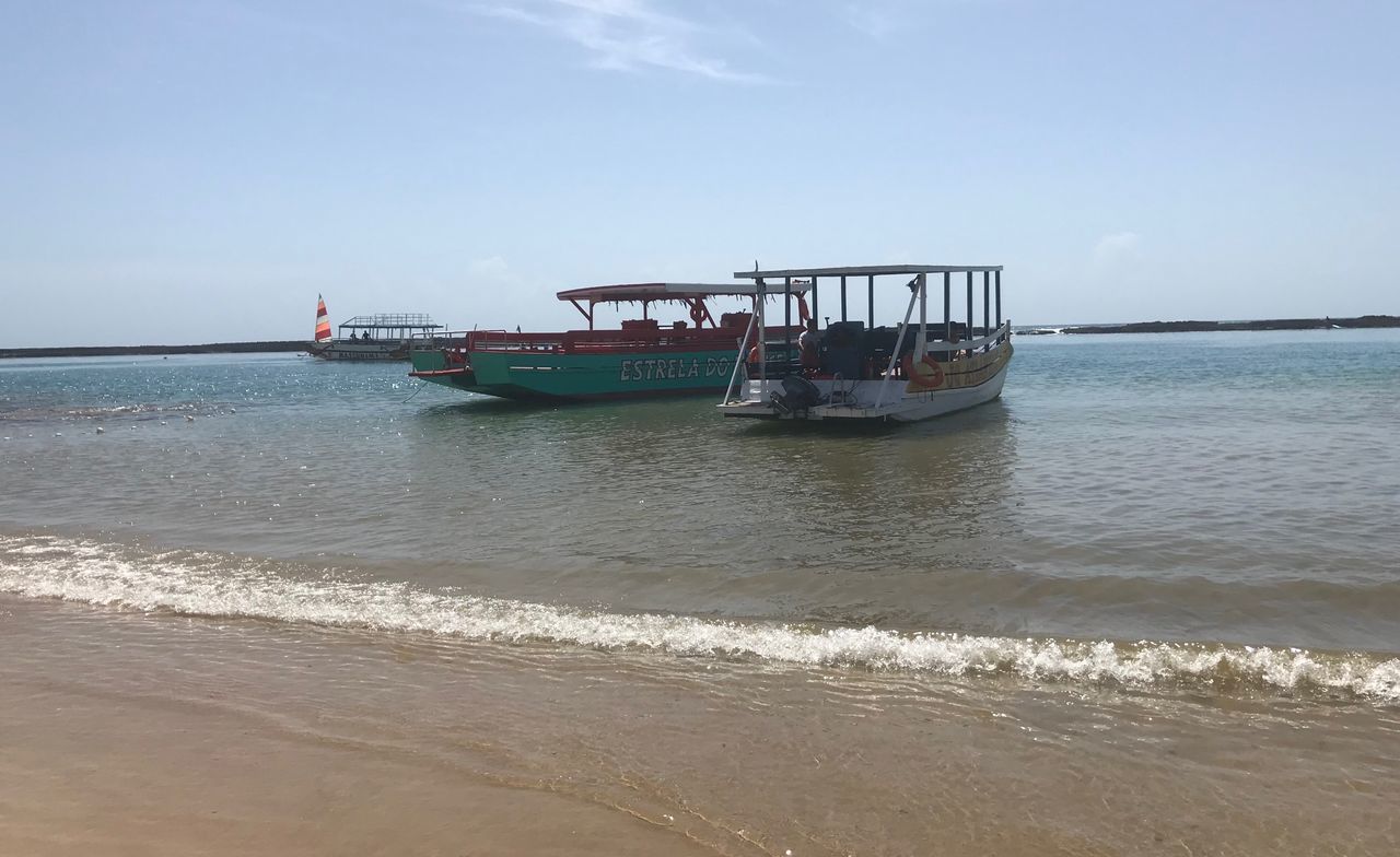 water, sea, sky, beach, land, nautical vessel, transportation, scenics - nature, nature, sand, beauty in nature, horizon, horizon over water, mode of transportation, day, wave, motion, tranquility, travel, outdoors, no people