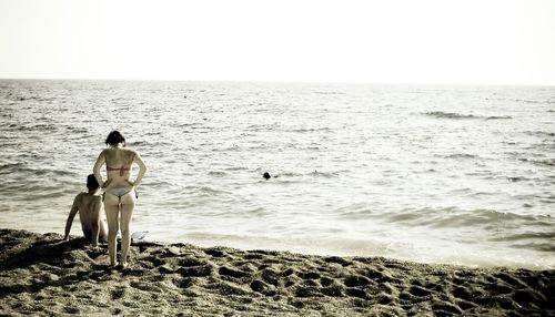 People standing on beach