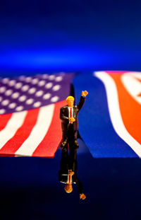 Close-up of flag against blue sky