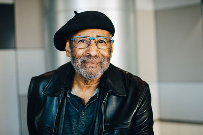 Portrait of smiling senior man with eyeglasses