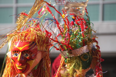 Close-up of people wearing colorful masks during carnival