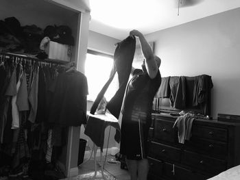 Panoramic shot of people at home