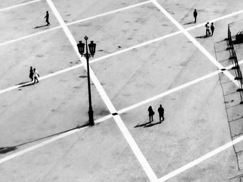 High angle view of people walking in city