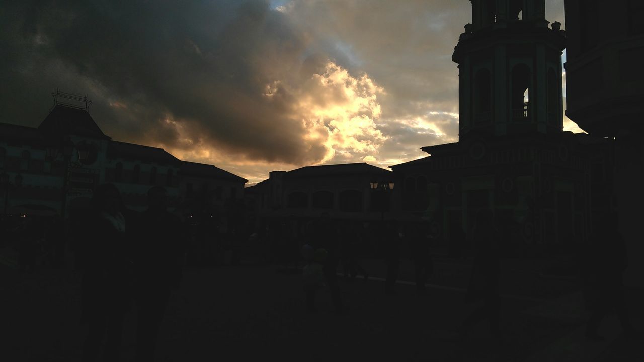 LOW ANGLE VIEW OF SILHOUETTE BUILT STRUCTURES AGAINST SUNSET