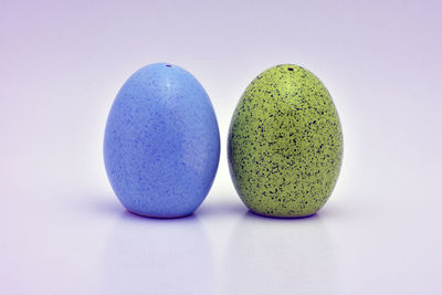 Close-up of candies against white background