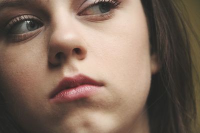 Close-up of beautiful girl looking away