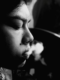 Close-up portrait of woman looking away