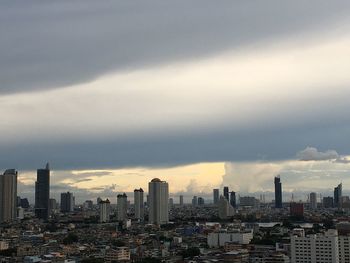 Modern buildings in city against sky