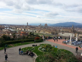 Tourists in front of cityscape