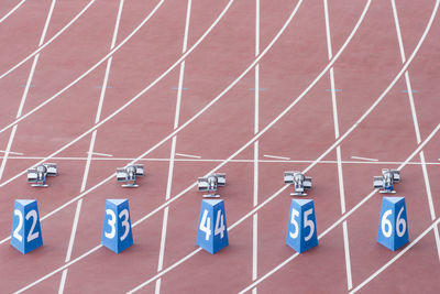 High angle view of numbers on running track at stadium