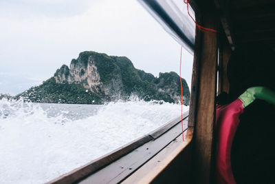 Scenic view of sea seen through window