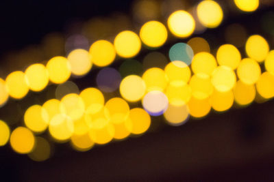 Defocused image of illuminated christmas lights