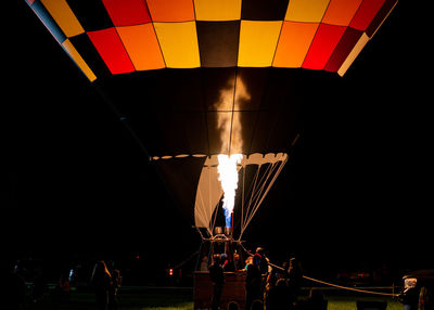View of illuminated hot air balloon at night