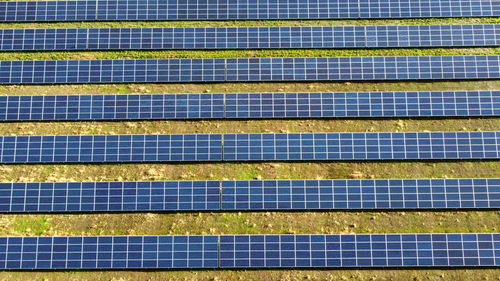 Aerial drone view flight over solar power station panels. aerial top view of solar farm. 