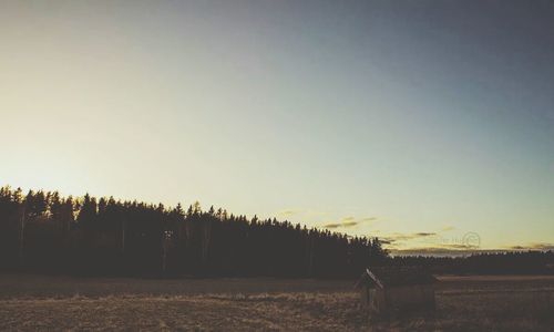 Scenic view of landscape at sunset